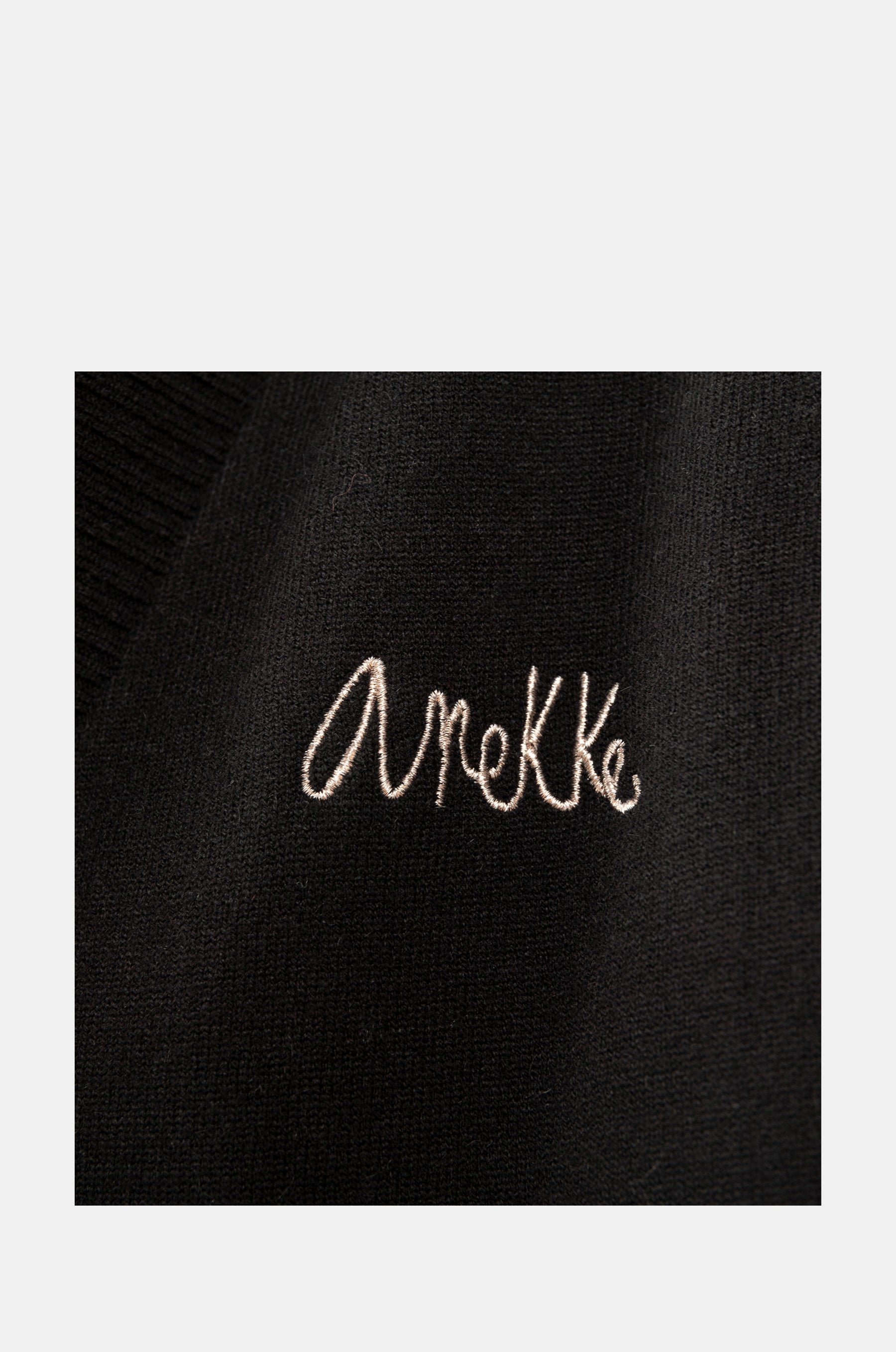 Black poncho-style jacket