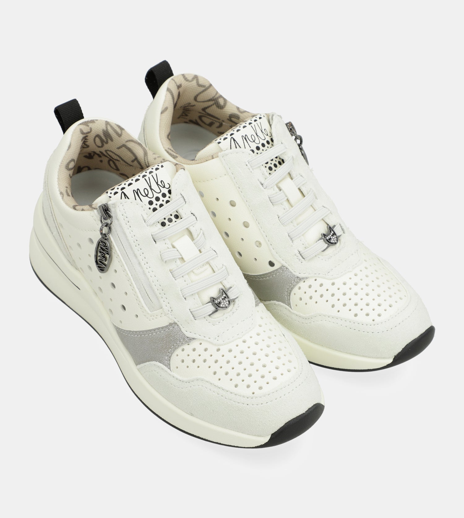 White wedge sneakers with polka dots