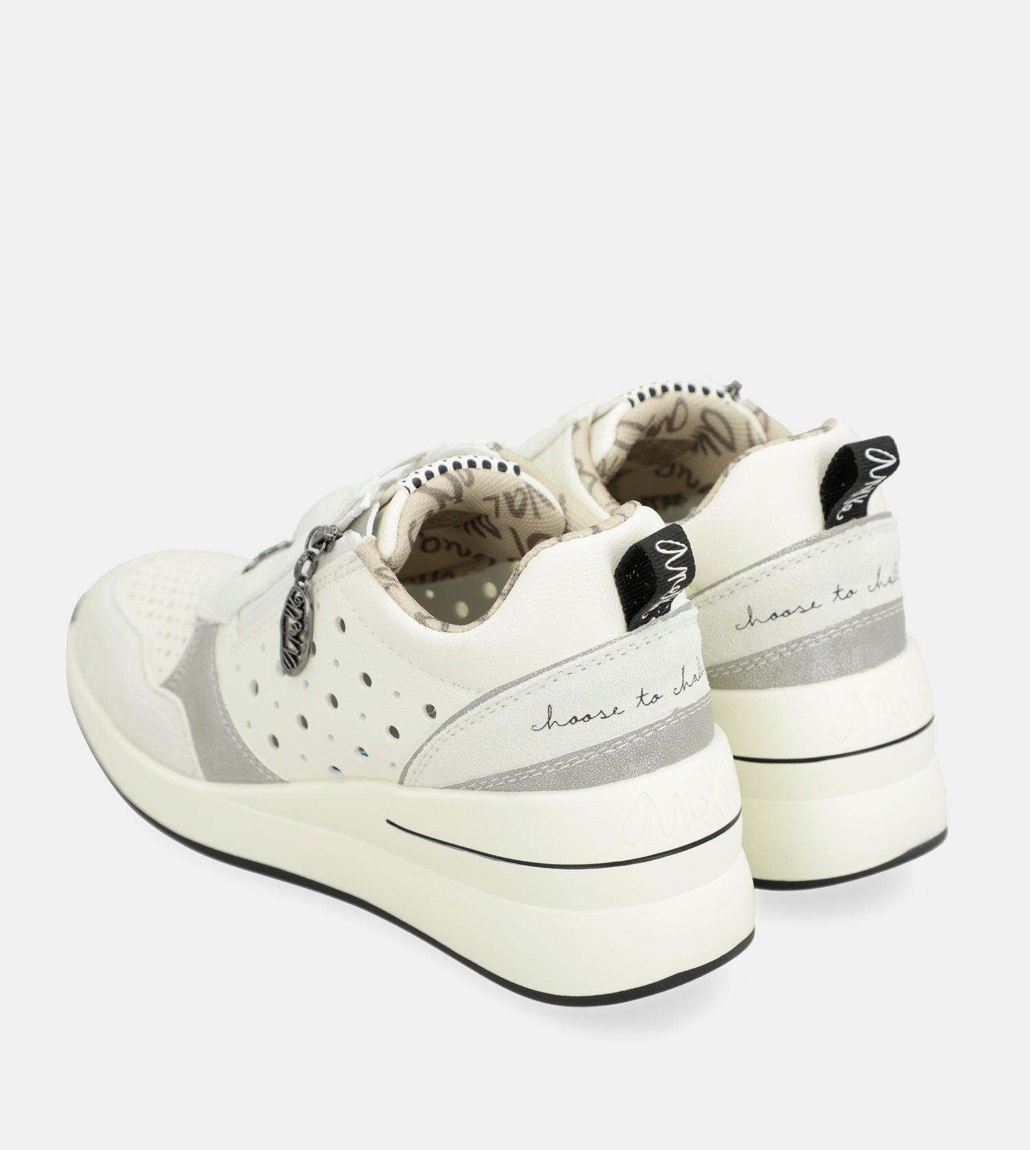 White wedge sneakers with polka dots