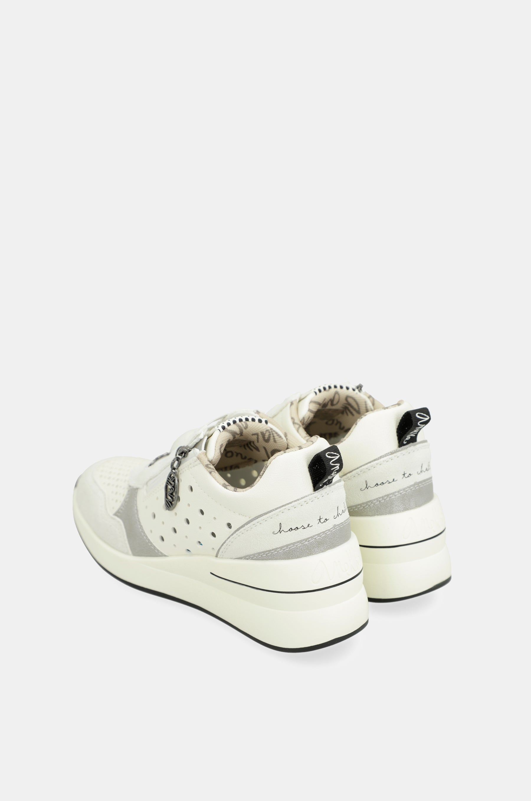 White wedge sneakers with polka dots
