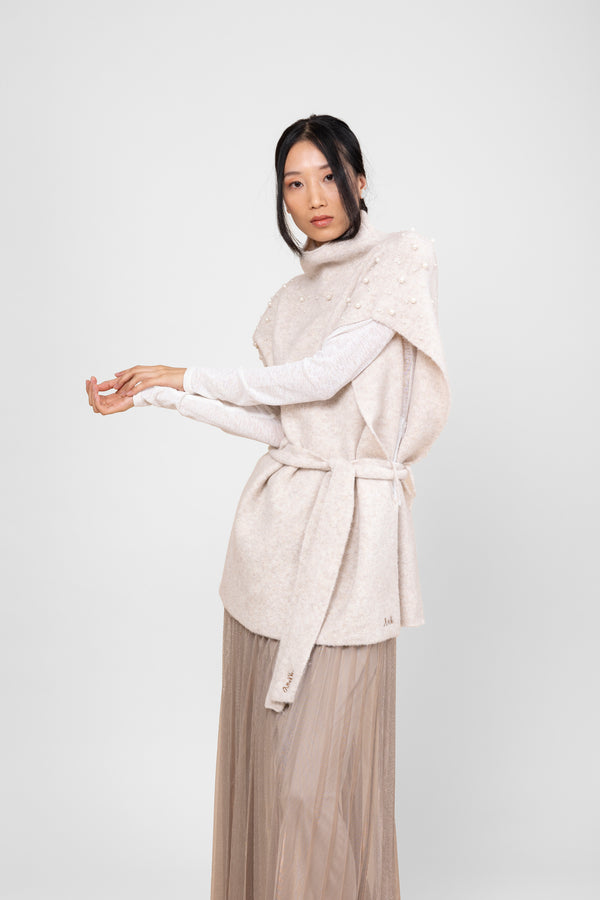 Off-white turtleneck poncho with belt