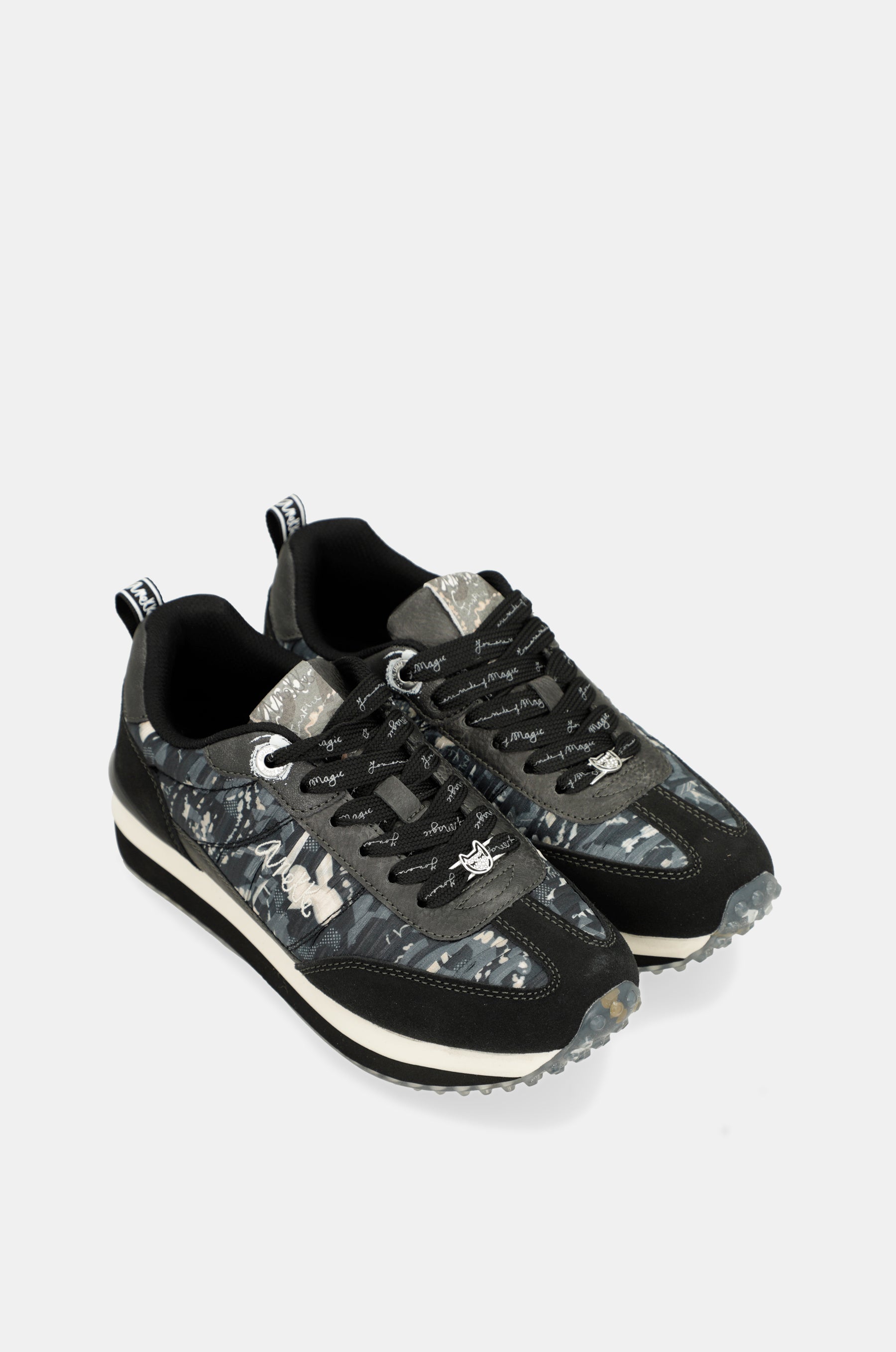 Black sneakers with multicoloured sole