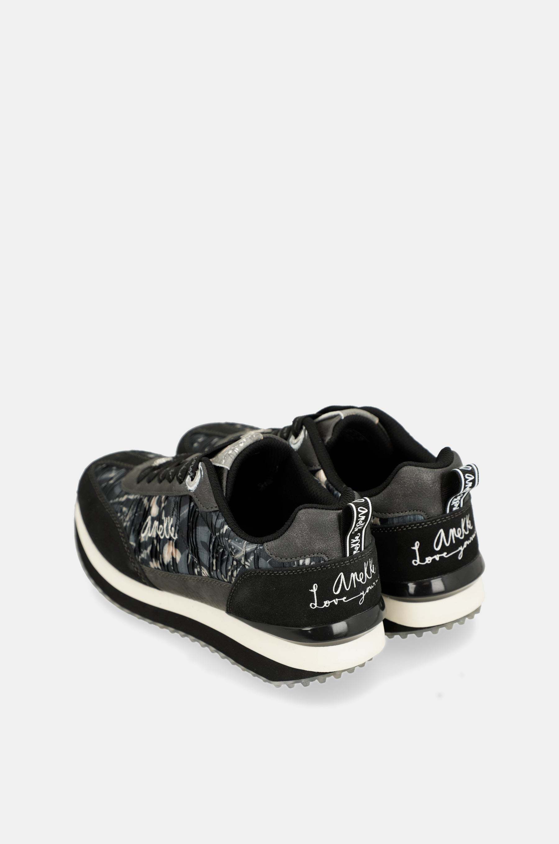 Black sneakers with multicoloured sole
