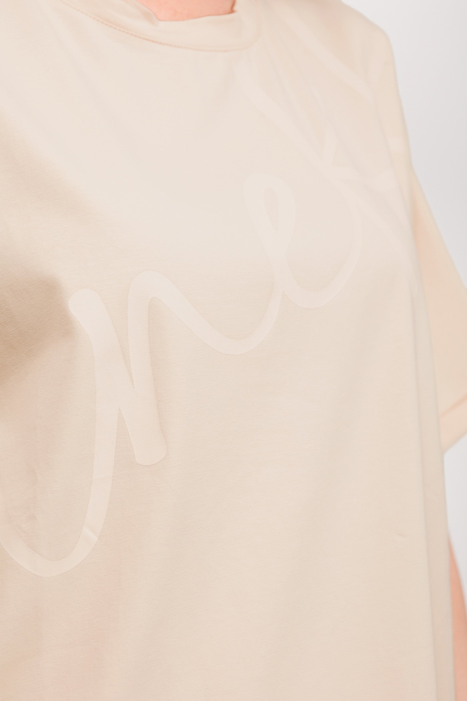 Beige short-sleeve T-shirt with print