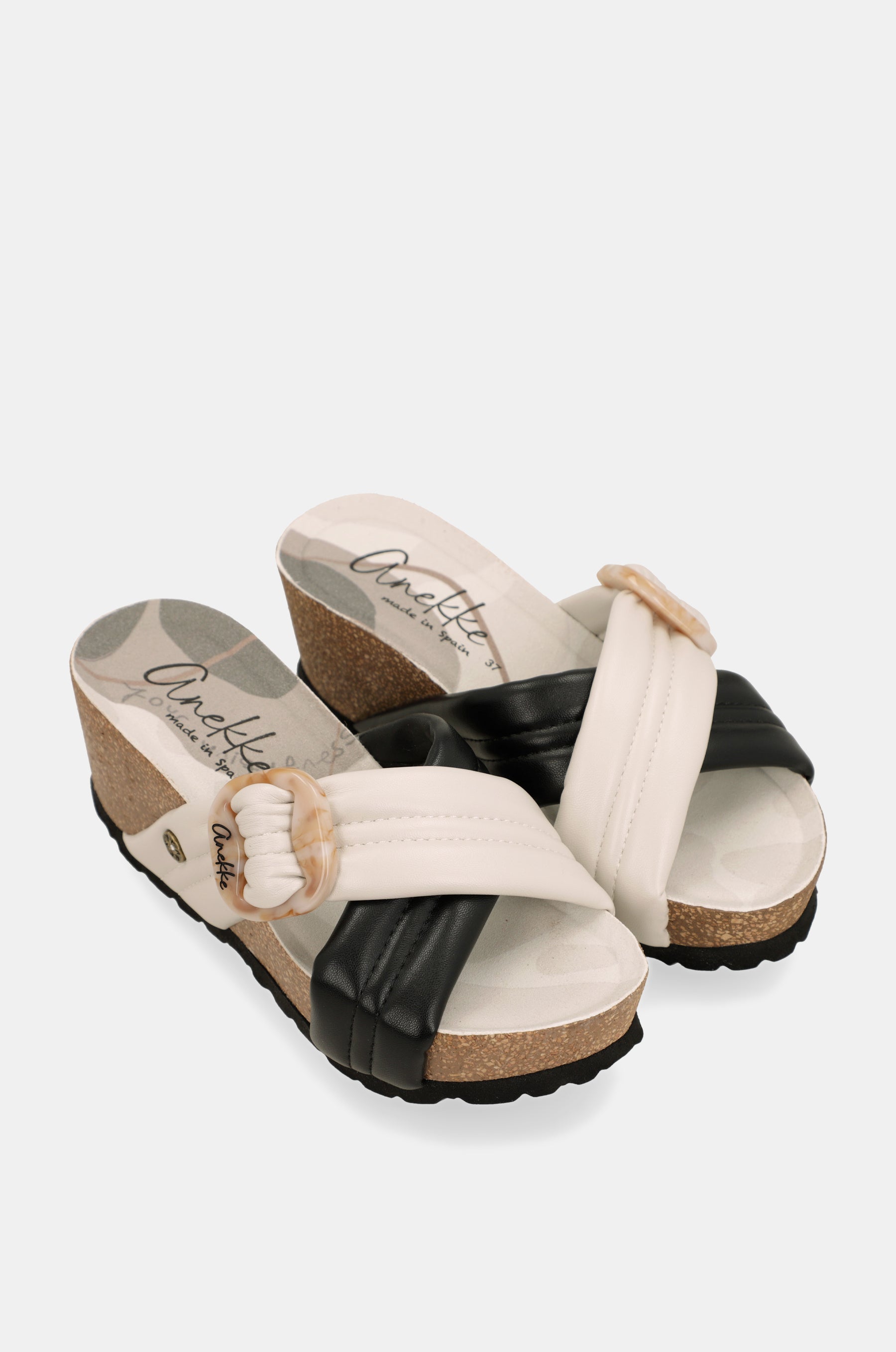 Black and white crossover sandals