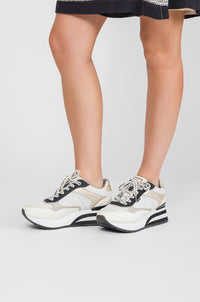 White sneakers with black details