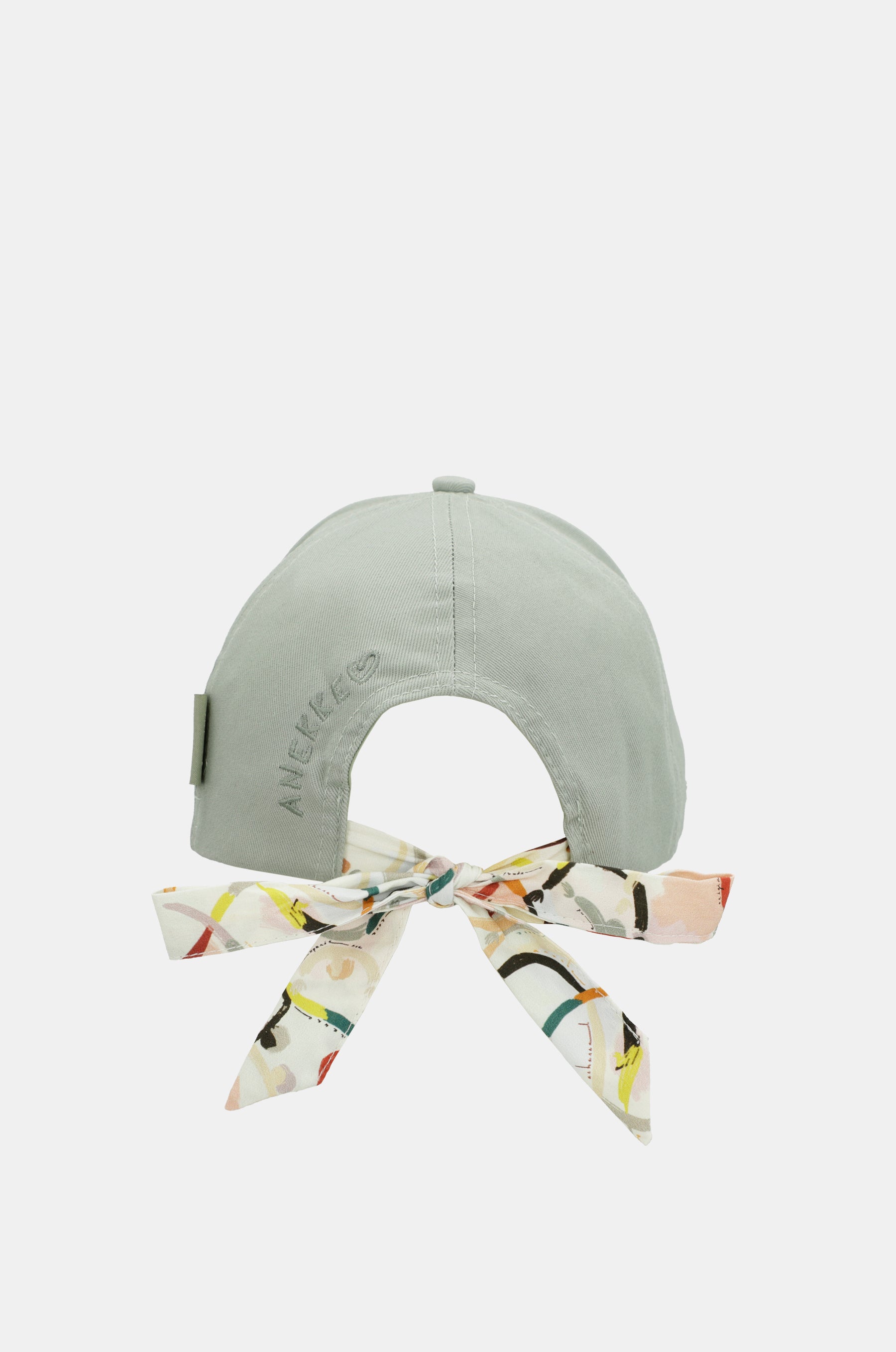Green cap with printed bow