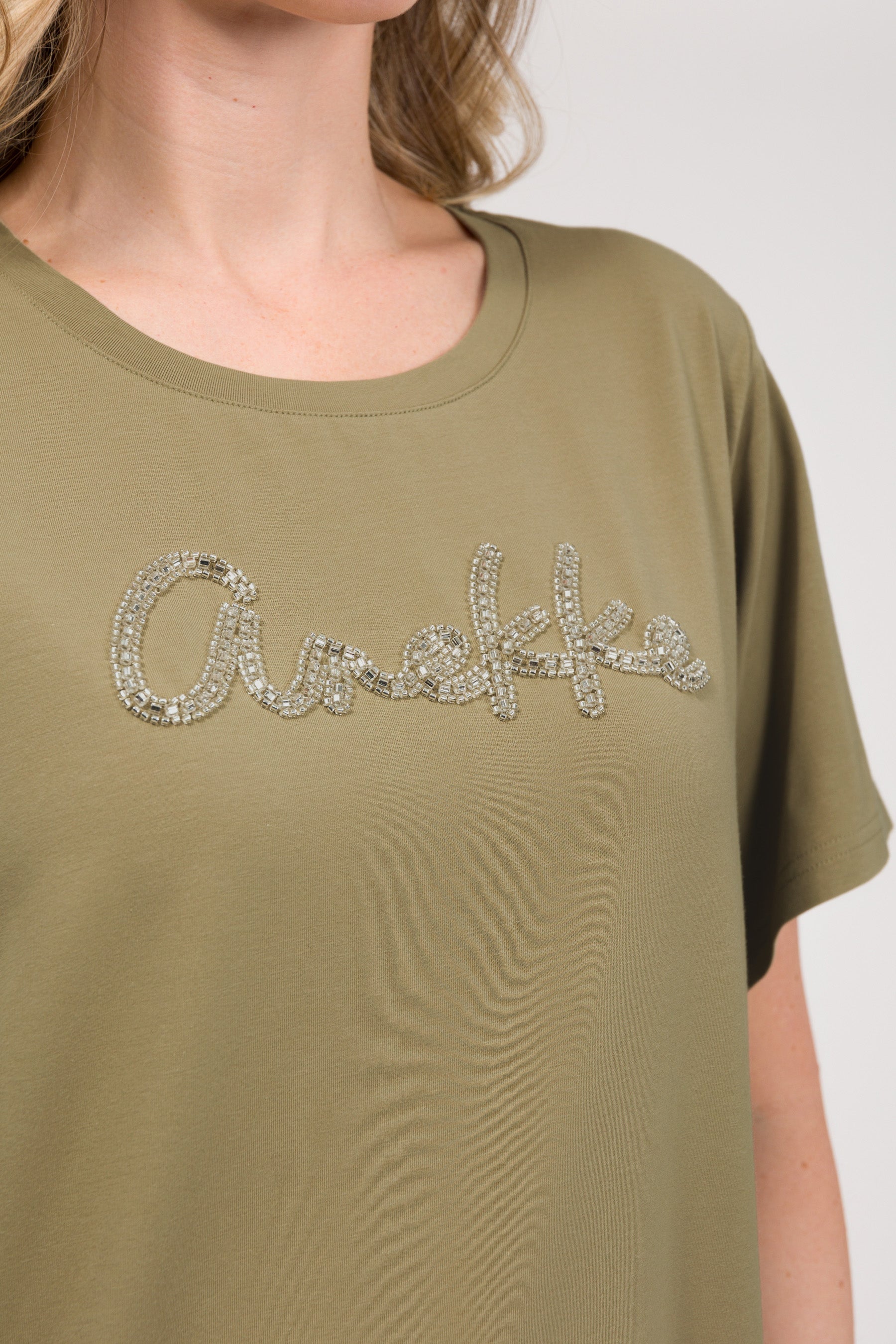 Green T-shirt with logo