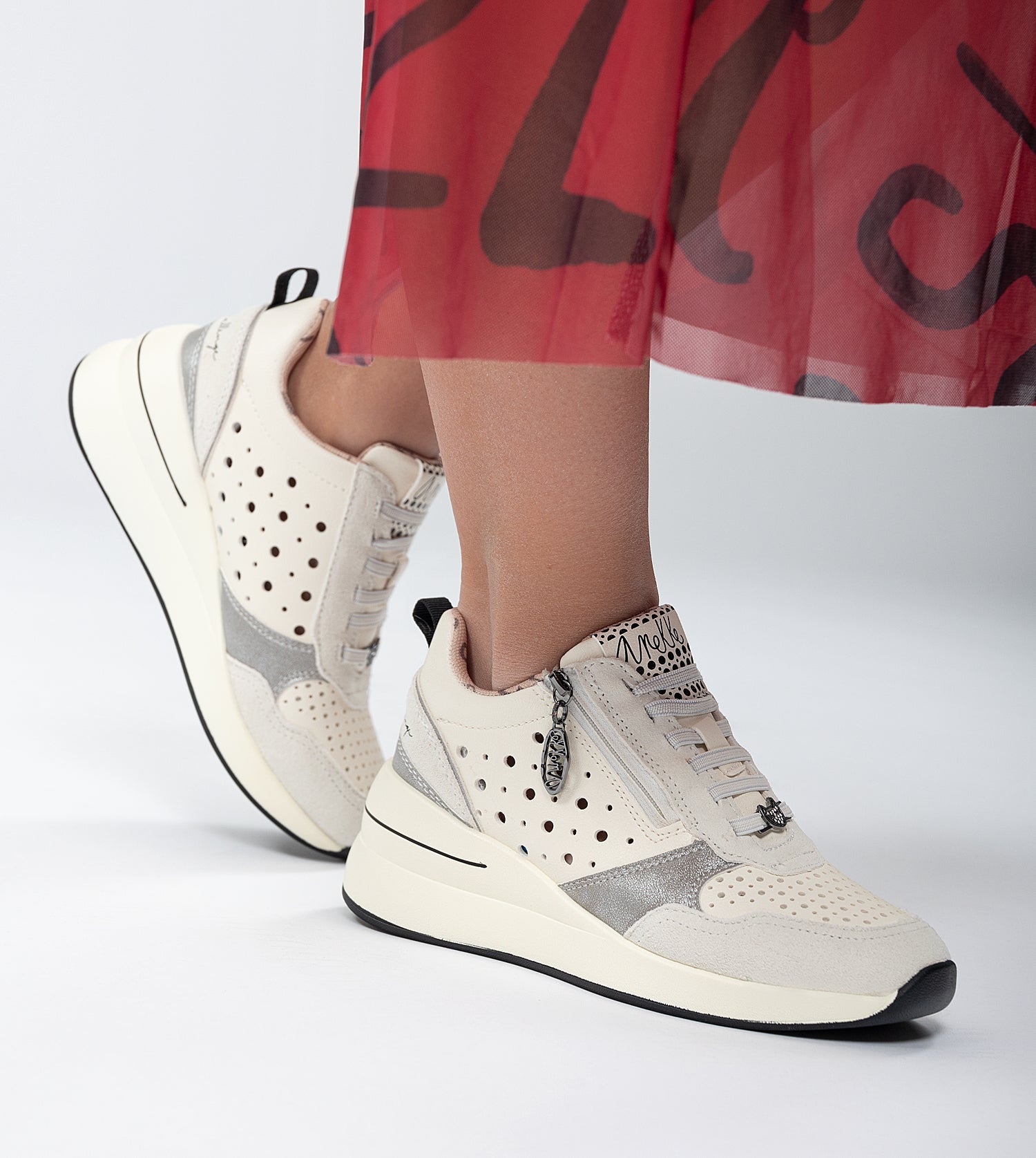 White wedge sneakers with polka dots