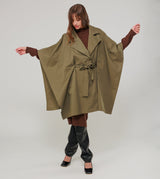 Green cape-style trench coat