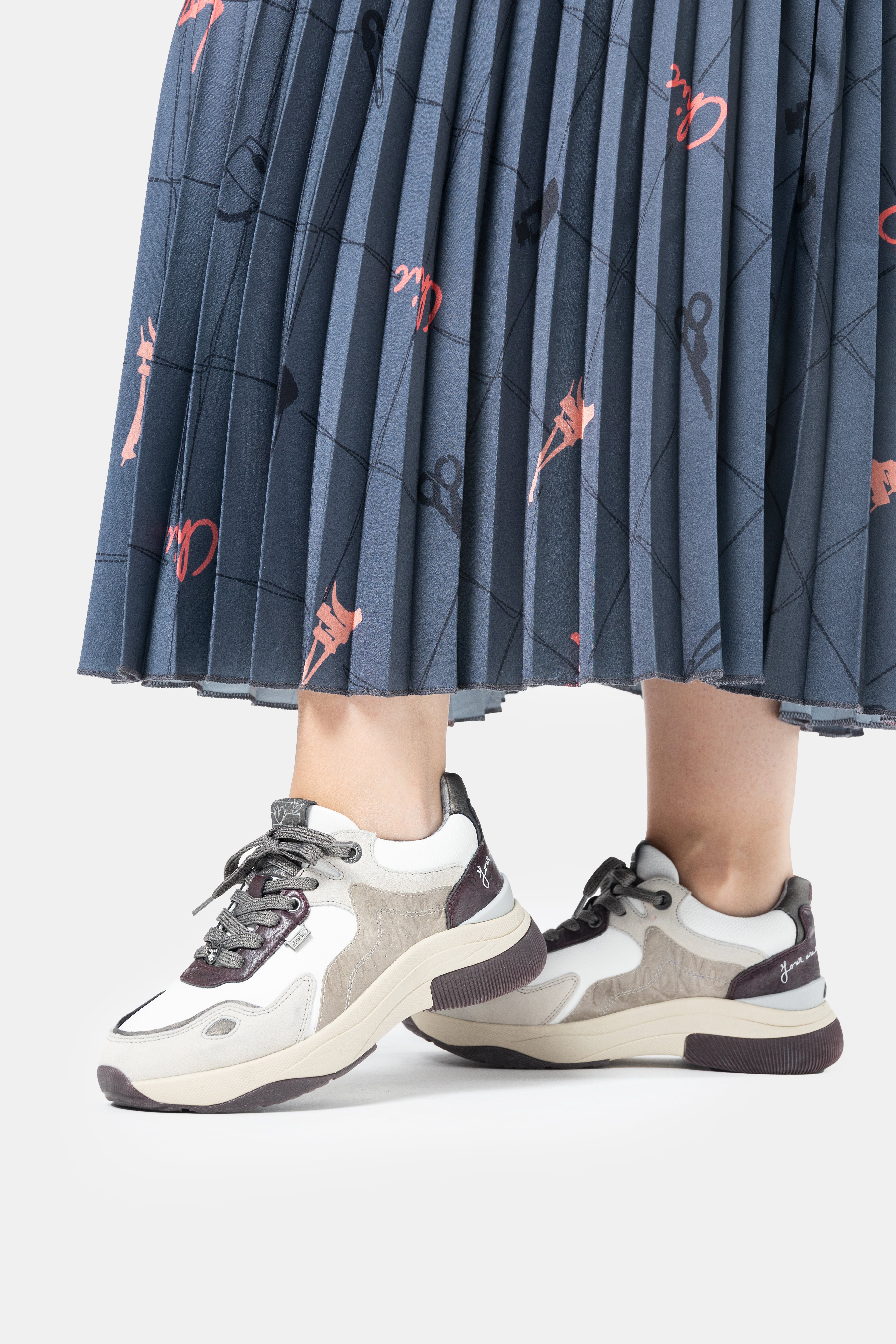 White & burgundy sneakers