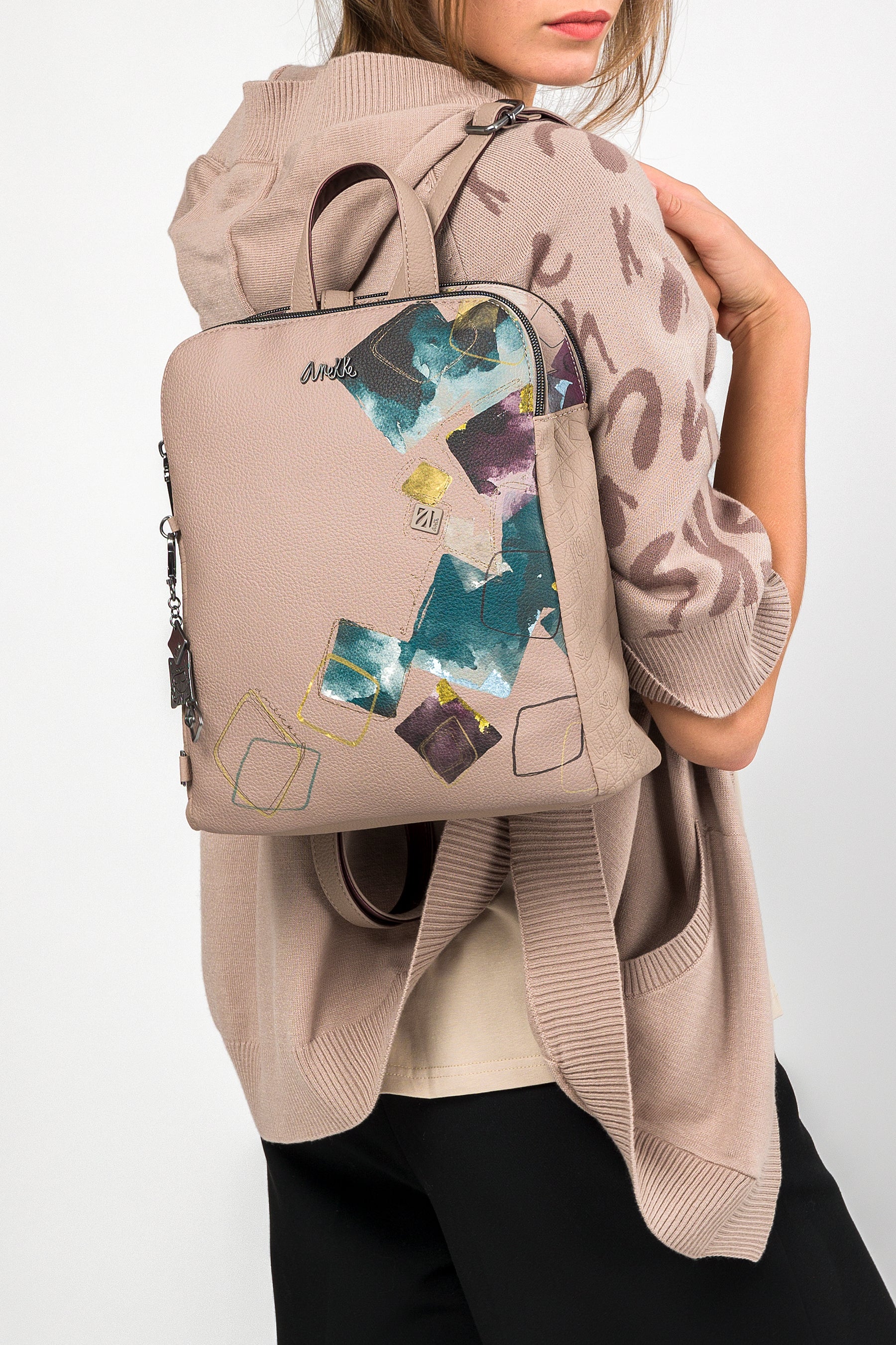 Evolution triple-compartment backpack