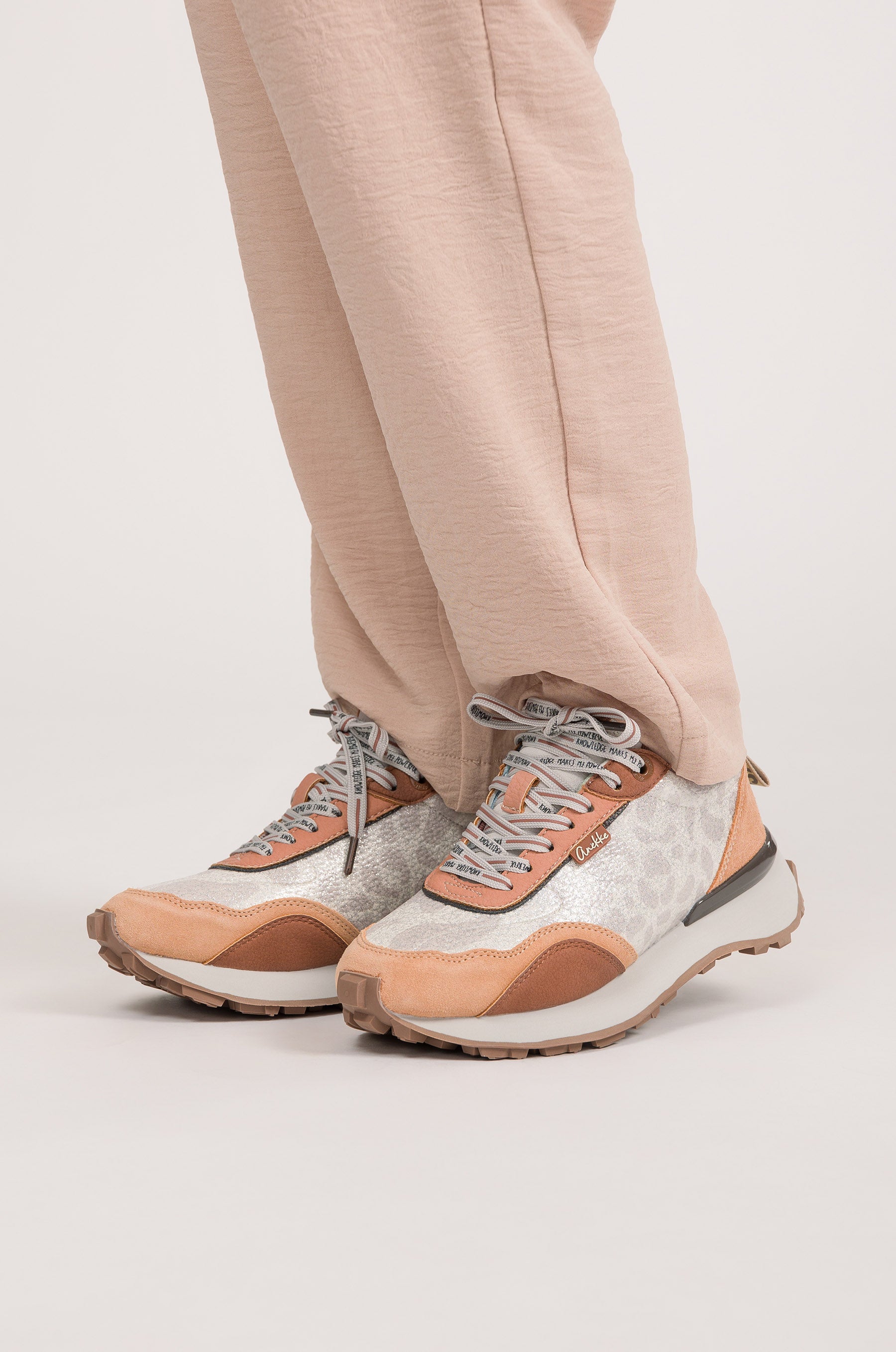 Beige and orange sneakers